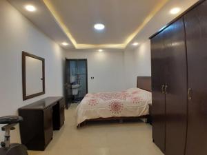 Postel nebo postele na pokoji v ubytování MK2 - One Bedroom Apartment