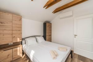 Posteľ alebo postele v izbe v ubytovaní Stone House Luna
