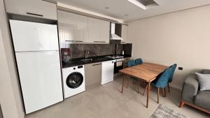 Kuchyň nebo kuchyňský kout v ubytování Selinti City Tatil Evleri1&1 + 5 fotografií