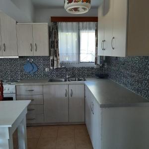 Kuchyňa alebo kuchynka v ubytovaní Ada's House