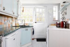 Kuhinja oz. manjša kuhinja v nastanitvi Snowdrop Cottage