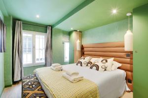 En eller flere senge i et værelse på Amazing Residence Caire Montorgueil