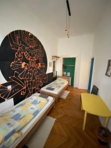 A bed or beds in a room at Kaleidoszkóp Ház Hostel