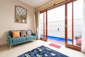 Ένα ή περισσότερα κρεβάτια σε δωμάτιο στο Chic Style 2BR Home with Pool in Ungasan +67 φωτογραφίες