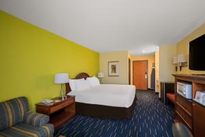 Ένα ή περισσότερα κρεβάτια σε δωμάτιο στο Americas Best Value Sandman Inn +25 φωτογραφίες