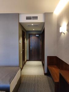 Postel nebo postele na pokoji v ubytování Orienta Hotel Gyumri