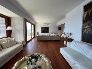 a living room with a couch and a table at Camogli - "Casa Oliver" - Liguria Holidays in Camogli +49 photos