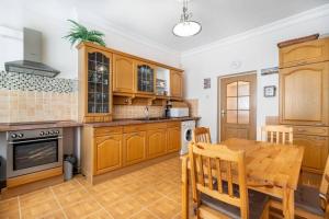 Kuchyň nebo kuchyňský kout v ubytování Apartment Albion