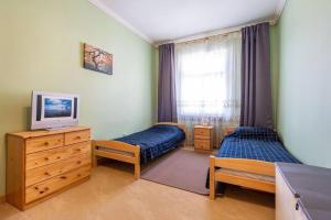 Postel nebo postele na pokoji v ubytování Apartment Albion