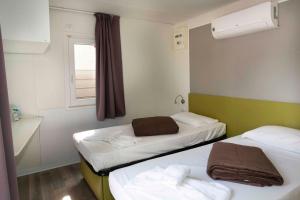hu Venezia Camping in Town客房内的一张或多张床位