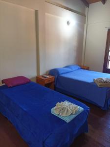 Una cama o camas en una habitación de Alojamiento céntrico florida