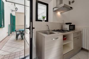 Kuchyň nebo kuchyňský kout v ubytování Wilma Apartment