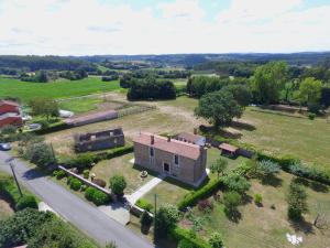 an aerial view of a house in a field at Casa Elvira in Marquiño