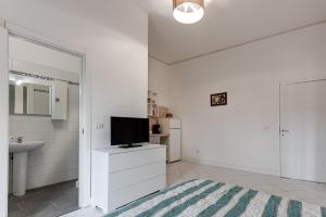 TV a/nebo společenská místnost v ubytování Ursa Apartment