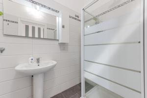 Koupelna v ubytování Ursa Apartment