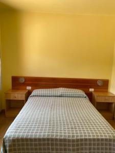 Posteľ alebo postele v izbe v ubytovaní Hostal Alt Llobregat