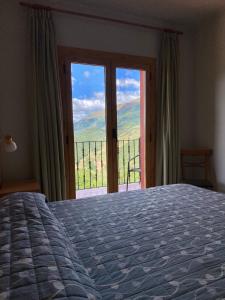 Posteľ alebo postele v izbe v ubytovaní Hostal Alt Llobregat