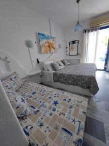 Vuode tai vuoteita majoituspaikassa Doron Hotel Delfini