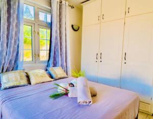 Postel nebo postele na pokoji v ubytování Cozy Home