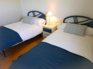 Postel nebo postele na pokoji v ubytování Agradable casa con jardín: Casasola