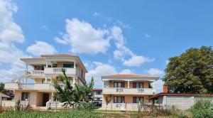 a large white building with balconies on top of it at House Varna-4 in Krapets