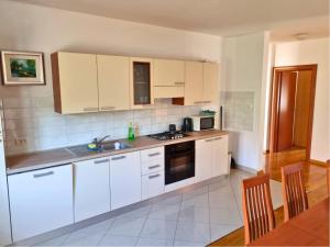 Kuchyň nebo kuchyňský kout v ubytování Miro Apartment