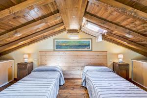 Postel nebo postele na pokoji v ubytování Casa vacanze Ester