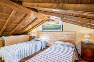 Postel nebo postele na pokoji v ubytování Casa vacanze Ester