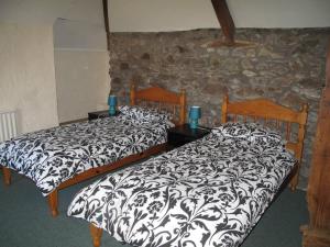 Postel nebo postele na pokoji v ubytování Beautiful Large Rural Cottage near Pencader