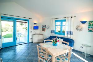 Televízia a/alebo spoločenská miestnosť v ubytovaní Casa Vacanze Diaz + 30 fotografií