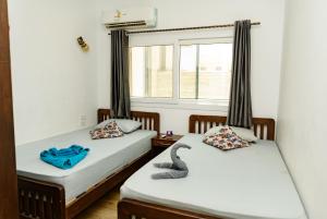 Cama ou camas em um quarto em Elite Residence Dahab