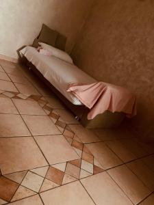 Postel nebo postele na pokoji v ubytování La Candida Rosa L T Anagni
