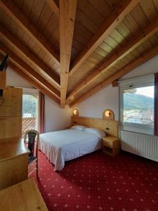 Postel nebo postele na pokoji v ubytování Hotel Cielo Blú