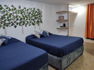 Postel nebo postele na pokoji v ubytování Hostal vitta + 37 fotografií