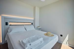 Postel nebo postele na pokoji v ubytování Ancón Suites
