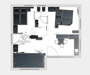 einen Grundriss eines Hauses mit schwarz-weiß in der Unterkunft Chalet Kasch Apartment Glück in Vols am Schlern