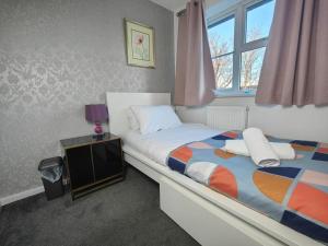 Ένα ή περισσότερα κρεβάτια σε δωμάτιο στο Tyburn Home, Birmingham with FREE Parking +31 φωτογραφίες
