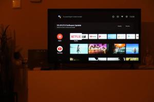 a flat screen tv with a website on it at 22 Apartment with private parking in Larisa +12 photos