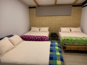 Postel nebo postele na pokoji v ubytování Casa de Campo Xiua Laguna d Fúquene