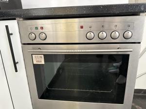 Kuchyň nebo kuchyňský kout v ubytování Davud Apartments