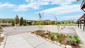 an empty parking lot with a street with houses at Winter Park Condo w/Hot Tub & 4 Mi to Skiing in Winter Park