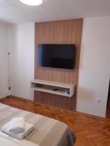 TV a/nebo společenská místnost v ubytování Apartments Mare