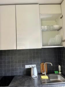 Kuchyň nebo kuchyňský kout v ubytování Hygge