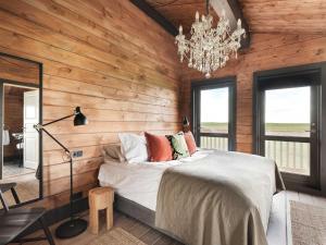 Postel nebo postele na pokoji v ubytování Laxá Lodge