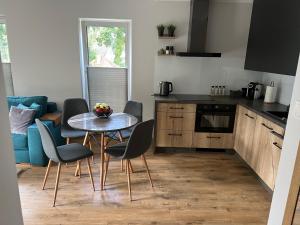 Kuchyň nebo kuchyňský kout v ubytování Apartament Baltic Residence Pobierowo