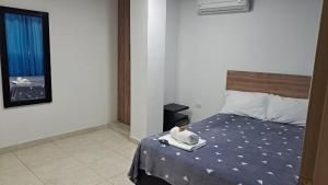 Voodi või voodid majutusasutuse Hotel Real del Valle toas
