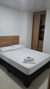 Voodi või voodid majutusasutuse Hotel Real del Valle toas