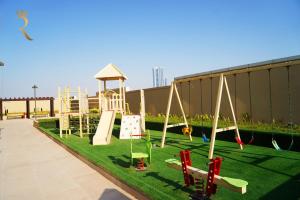 Herní místnost nebo prostor pro děti v ubytování Diamond 2BR Luxurious Retreat in Al Reem
