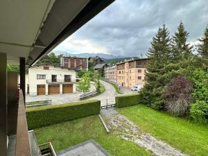 a view from the balcony of a building at Studio cosy au pied des pistes avec balcon, proche centre et piscine, navette gratuite - FR-1-515-172 in Villard-de-Lans