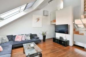 A seating area at LUXURY CENTRAL DUPLEX WITH TERRACE